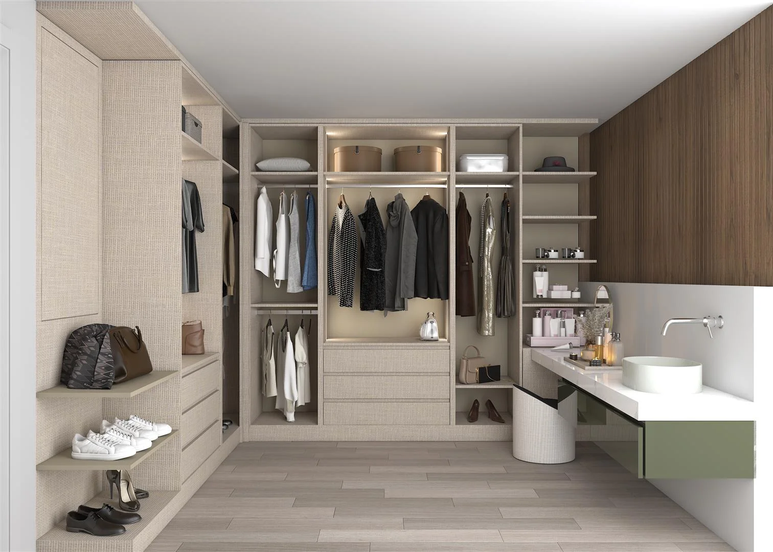 A D'CASSA walk-in closet with clothes and a sink.